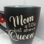 MOM A TITLE JUST ABOVE QUEEN